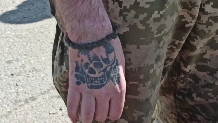 Рука с татуировкой